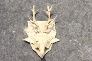Illustration for article titled Papercraft Genius Creates Origami Dragons, Grim Reaper, and More